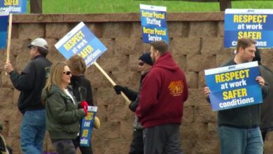 Twin Cities postal workers rally over reported